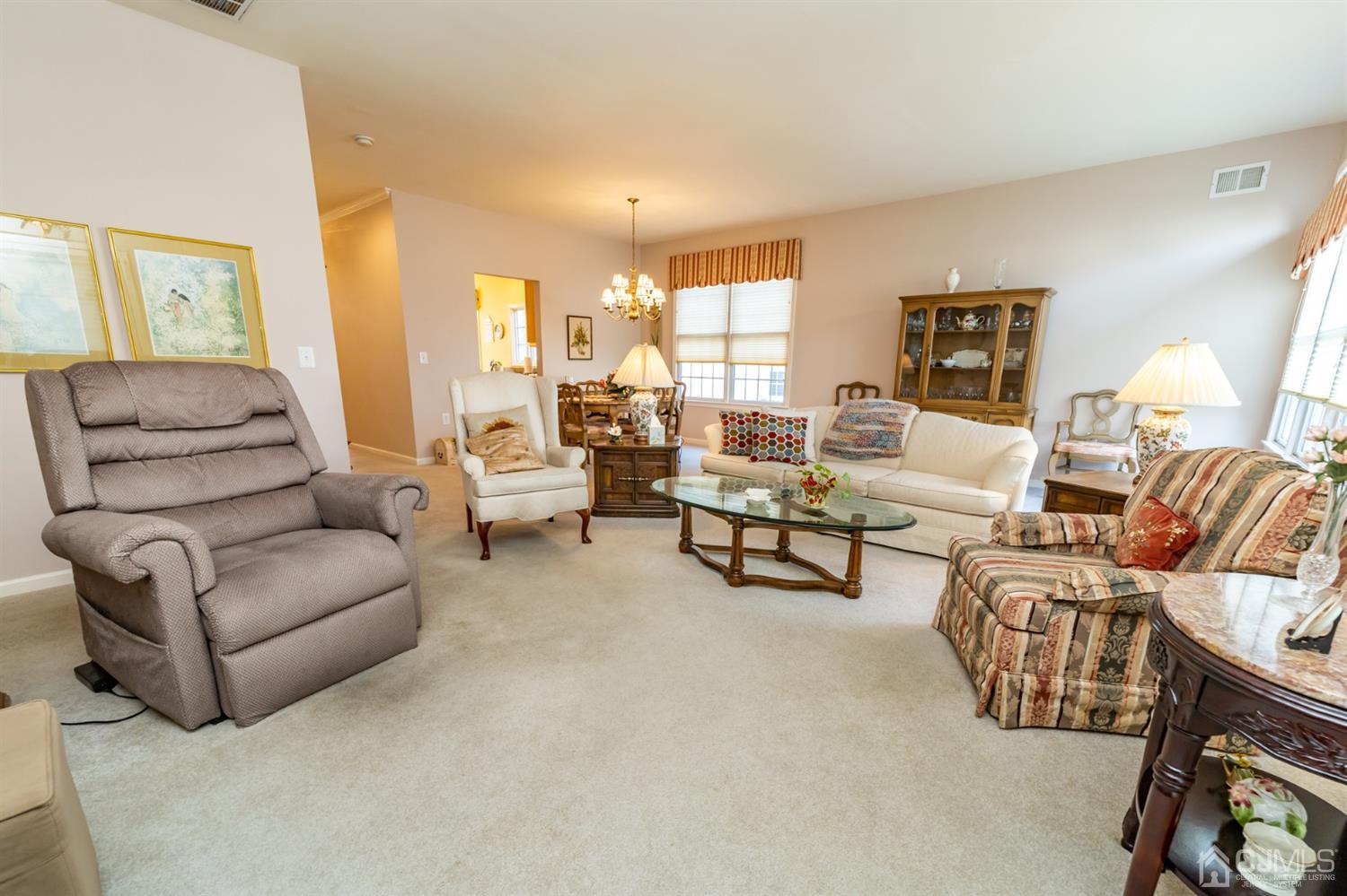 15 Stryker Road Somerset, NJ 08873 - Photo 12 of 24 a living room with furniture and a large window