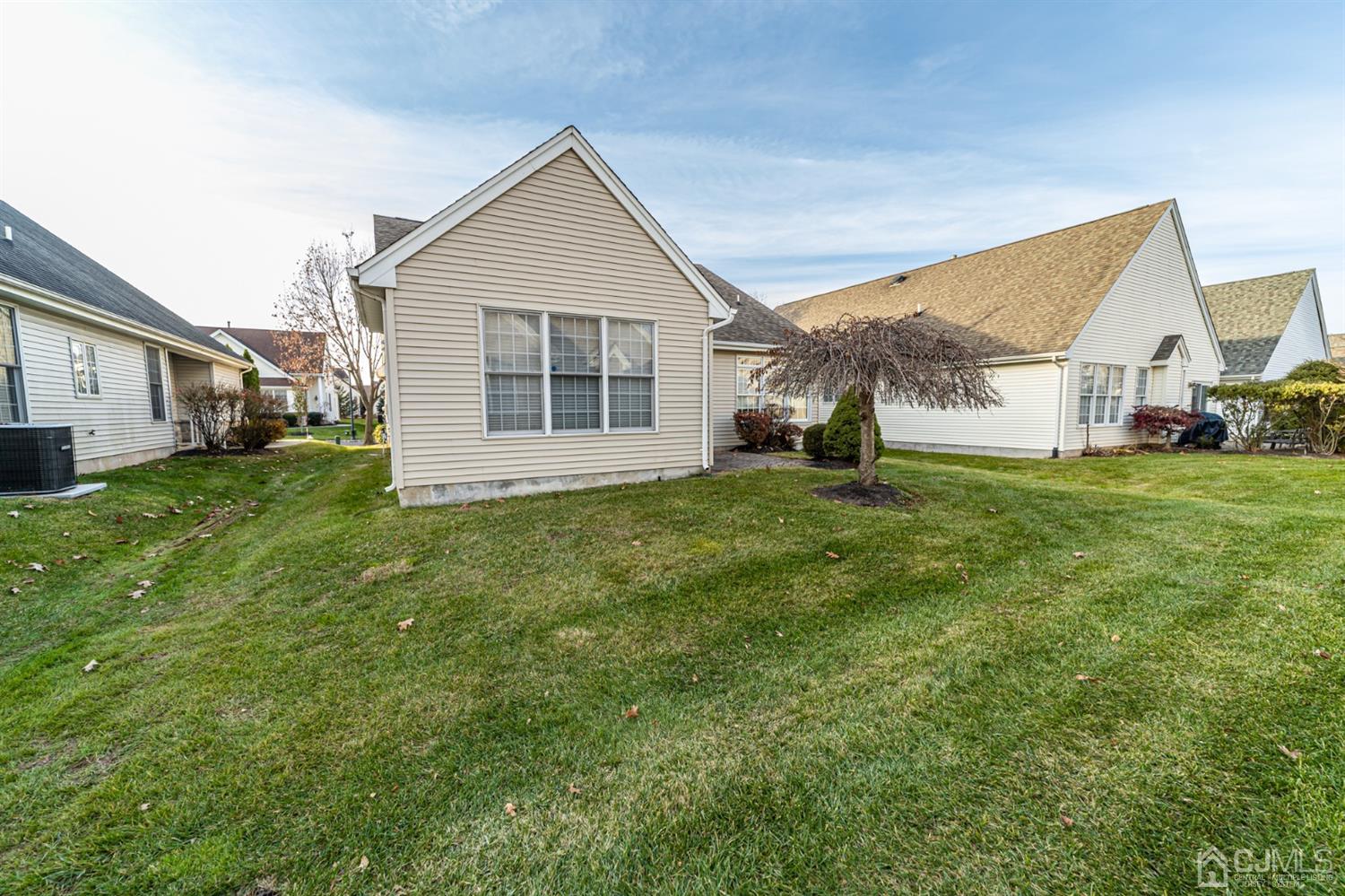 15 Stryker Road Somerset, NJ 08873 - Photo 23 of 24 a view of a house with a big yard and large trees