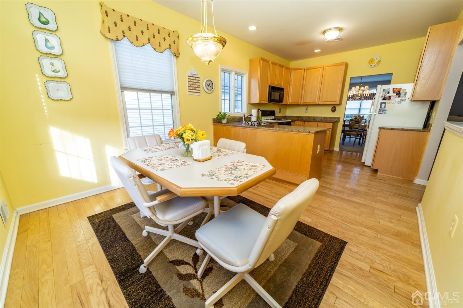 15 Stryker Road Somerset, NJ 08873 - Photo 4 of 24 a view of a dining room with furniture and a table