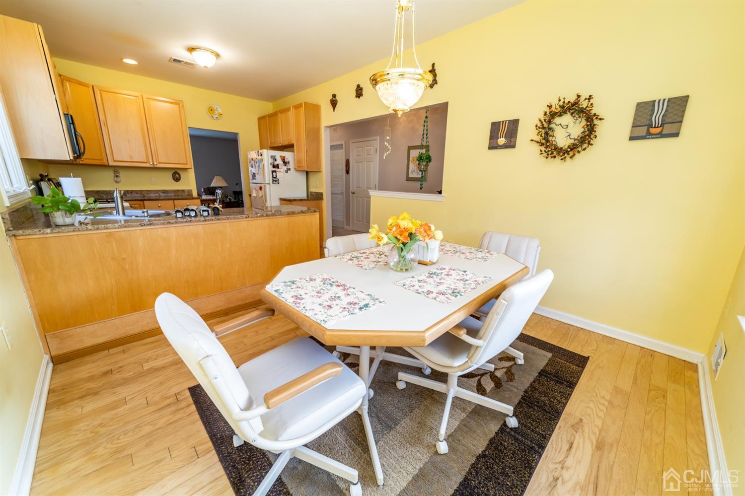 15 Stryker Road Somerset, NJ 08873 - Photo 5 of 24 a view of a dining room with furniture and wooden floor