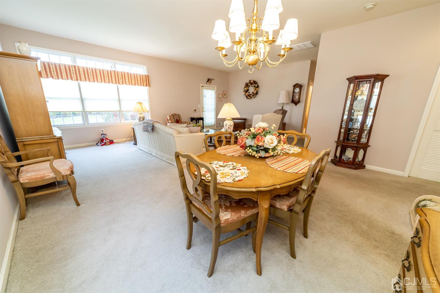 15 Stryker Road Somerset, NJ 08873 - Photo 9 of 24 a view of a dining room with furniture window and outside view