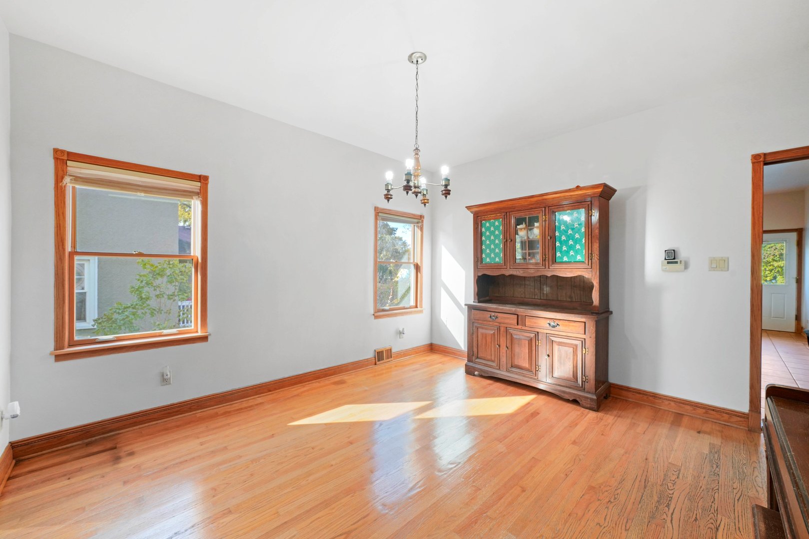 296 Addison Road Riverside, IL 60546 - Photo 8 of 34 a view of a room with window and wooden floor