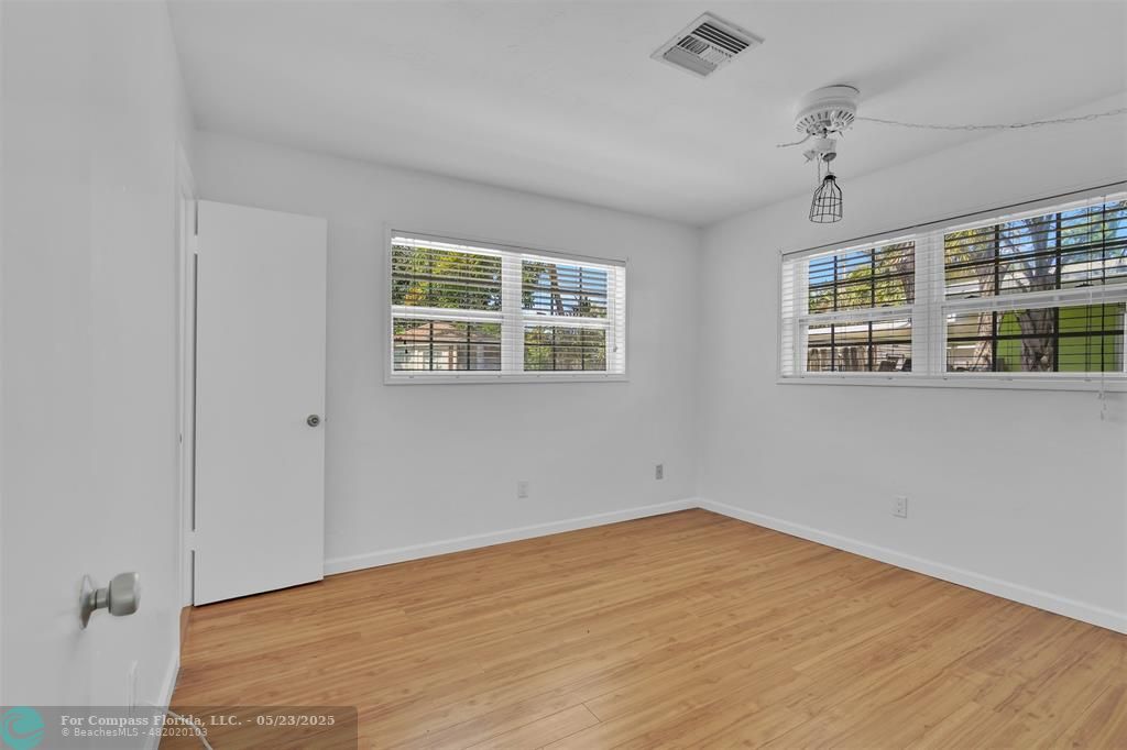 341 Southeast 8th Street Pompano Beach, FL 33060 - Photo 17 of 56 a view of an empty room with a window