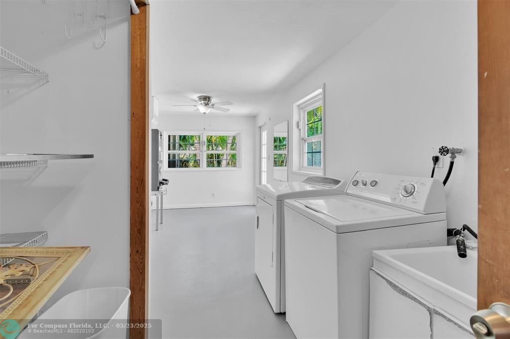 341 Southeast 8th Street Pompano Beach, FL 33060 - Photo 44 of 56 a utility room with dryer and washer