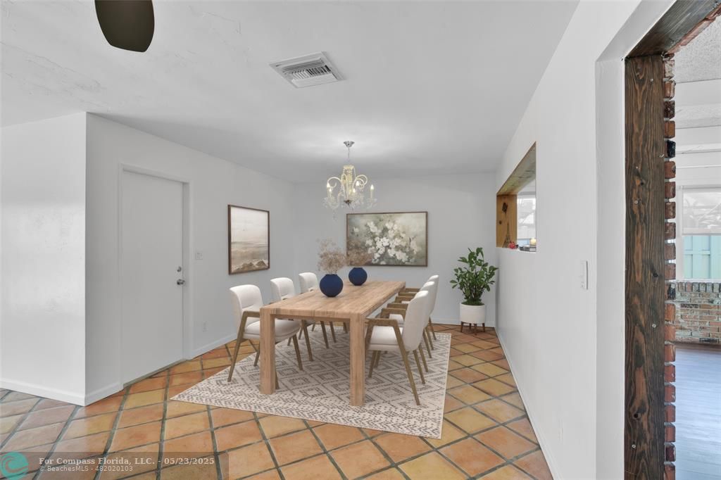 341 Southeast 8th Street Pompano Beach, FL 33060 - Photo 8 of 56 a dining room with furniture and window