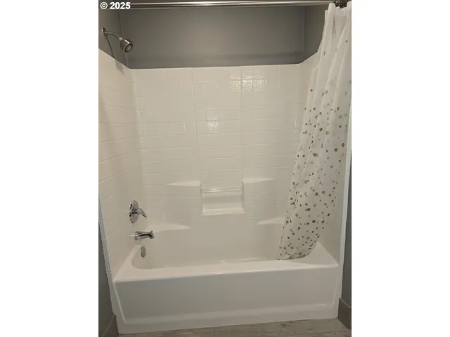 a bathroom with a bathtub