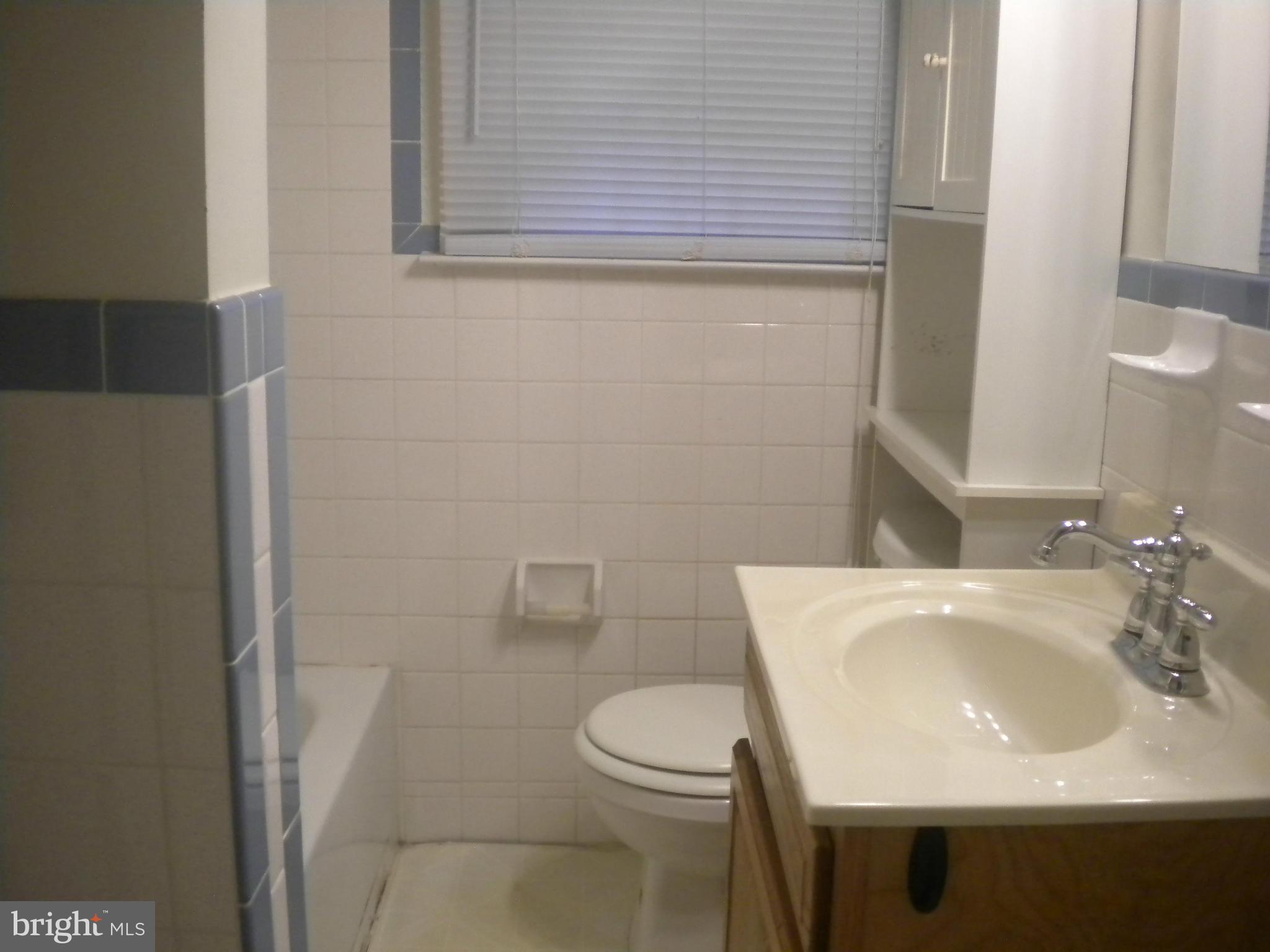 2 Patapsco Road Linthicum Heights, MD 21090 - Photo 7 of 12 a bathroom with a sink and a toilet