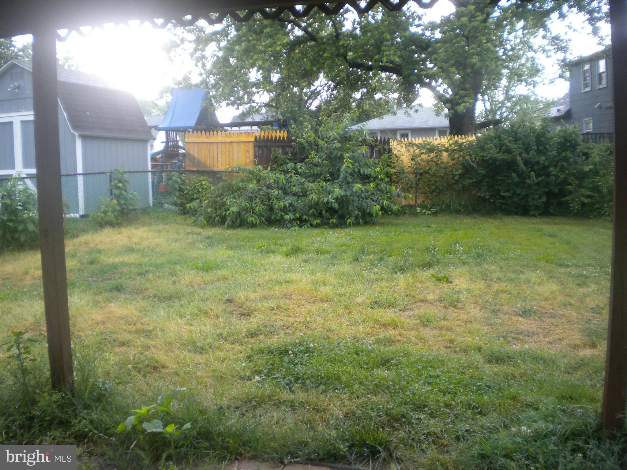 2 Patapsco Road Linthicum Heights, MD 21090 - Photo 9 of 12 a view of a yard in front of house