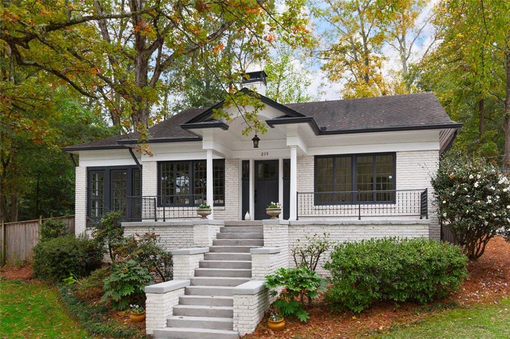 235 Geneva Street Decatur, GA 30030 - Photo 1 of 1 a front view of a house with a yard