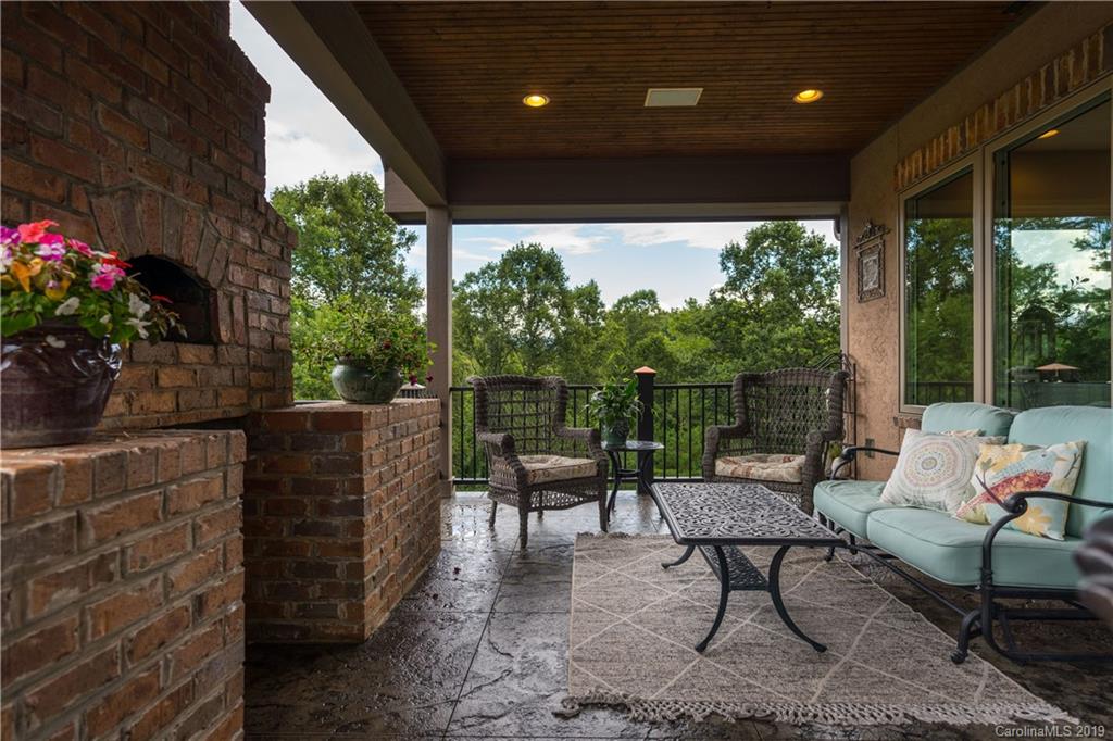 65 Waterhill Way Fletcher, NC 28732 - Photo 13 of 48 a outdoor living space with furniture and garden view