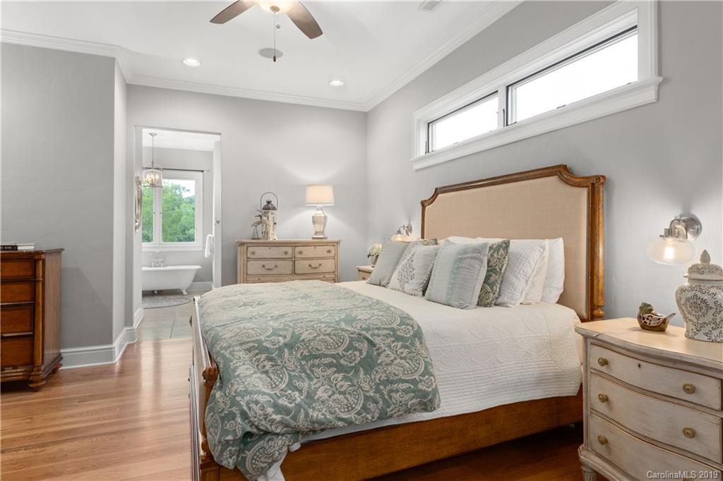 65 Waterhill Way Fletcher, NC 28732 - Photo 29 of 48 a bedroom with a bed and wooden floor