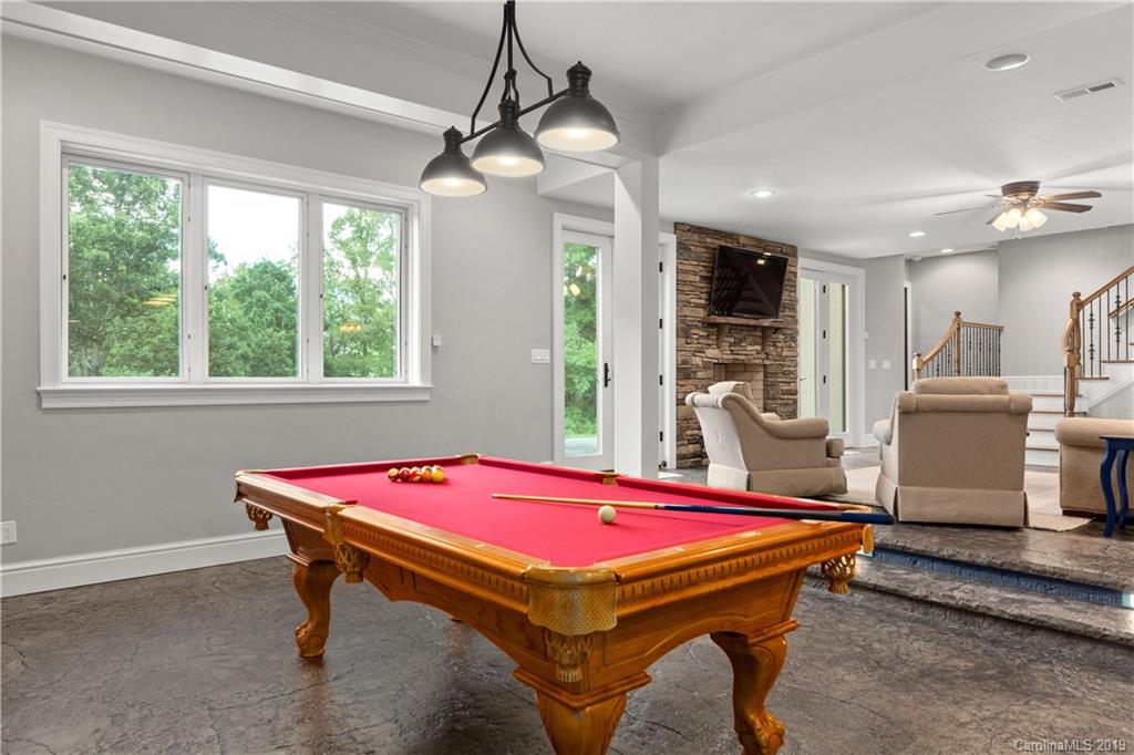 65 Waterhill Way Fletcher, NC 28732 - Photo 39 of 48 a room with pool table and windows