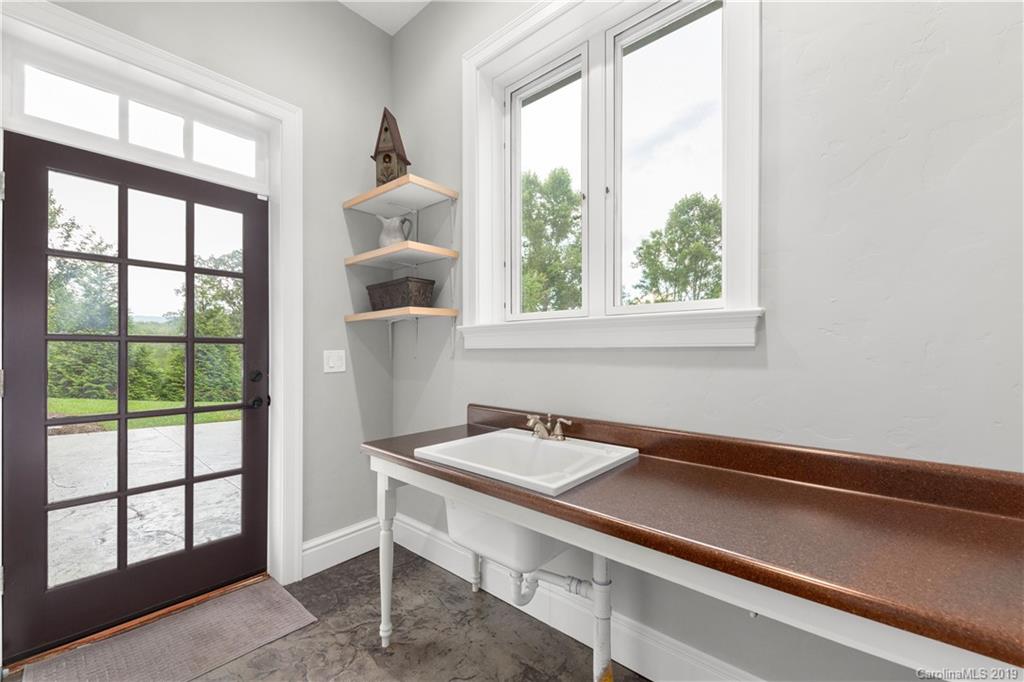 65 Waterhill Way Fletcher, NC 28732 - Photo 40 of 48 a room that has a window and furniture