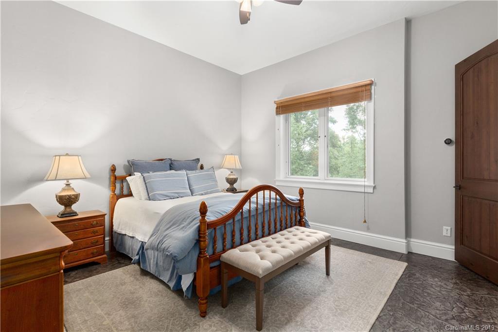 65 Waterhill Way Fletcher, NC 28732 - Photo 41 of 48 a bedroom with bed and a window