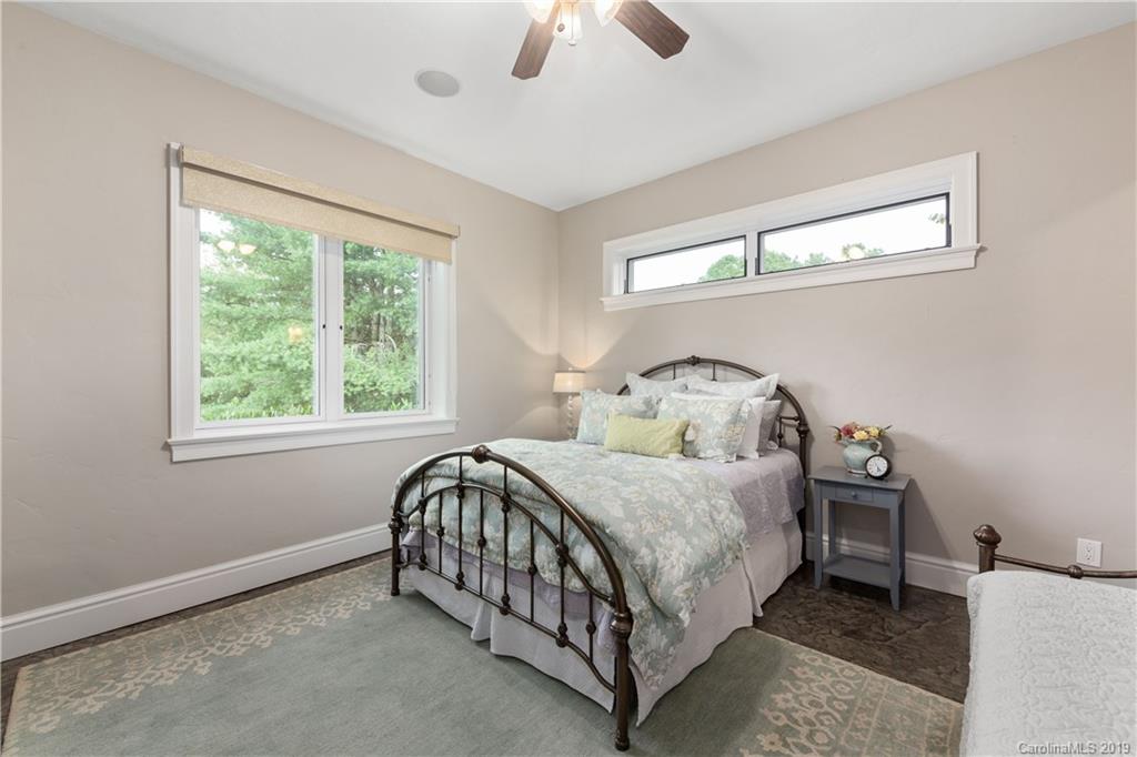 65 Waterhill Way Fletcher, NC 28732 - Photo 45 of 48 a bedroom with a bed and window