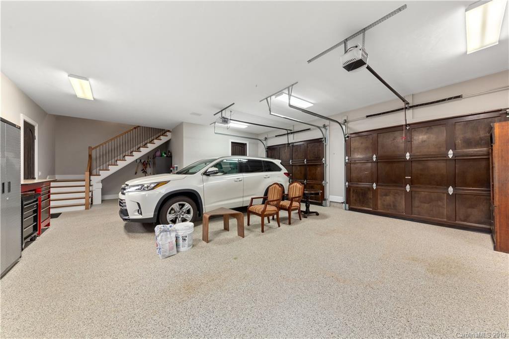 65 Waterhill Way Fletcher, NC 28732 - Photo 48 of 48 a view of a garage with parked cars