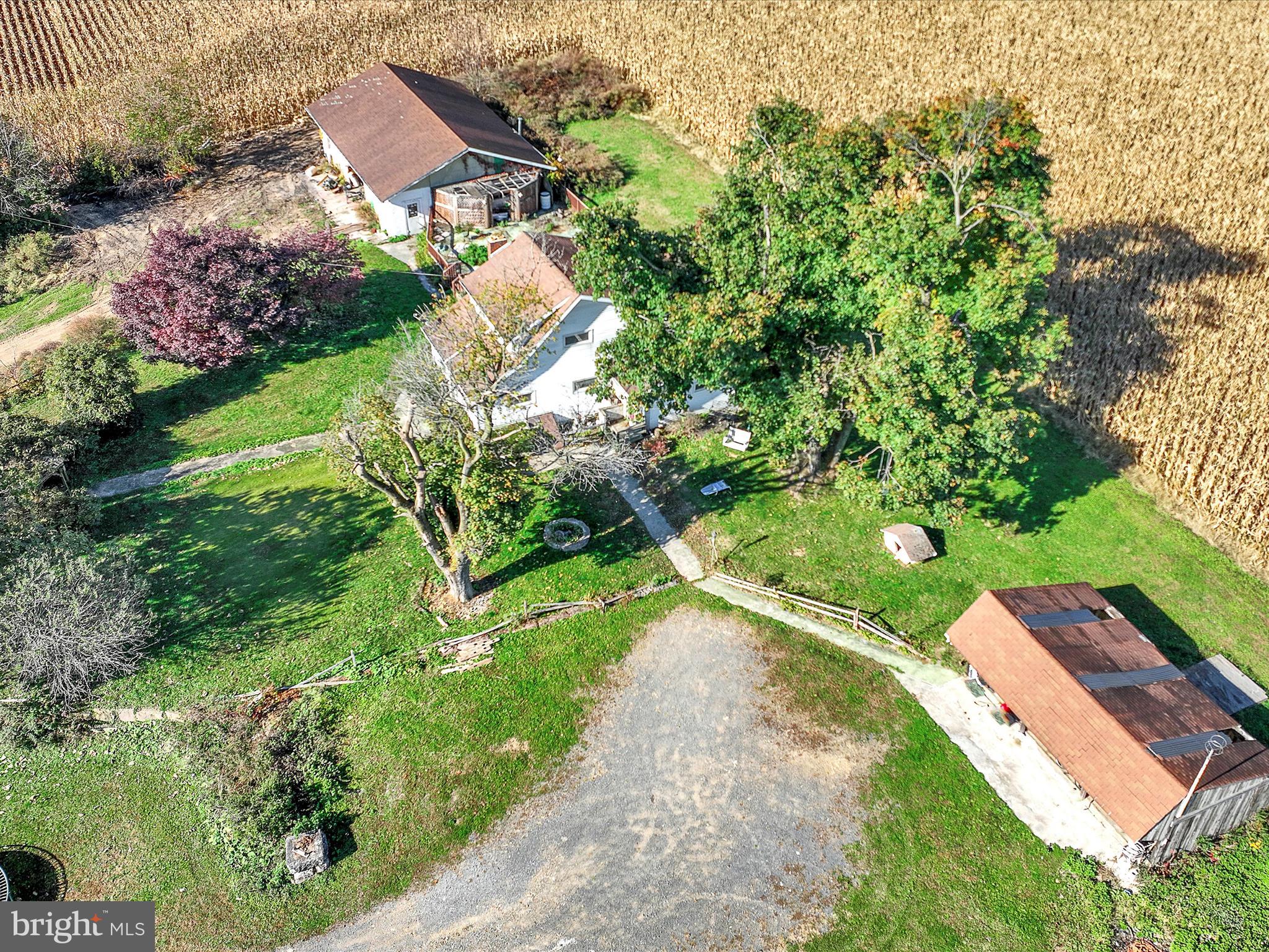 389 Sweet Arrow Lake Road Pine Grove, PA 17963 - Photo 11 of 59 a backyard of a house with a yard and outdoor seating