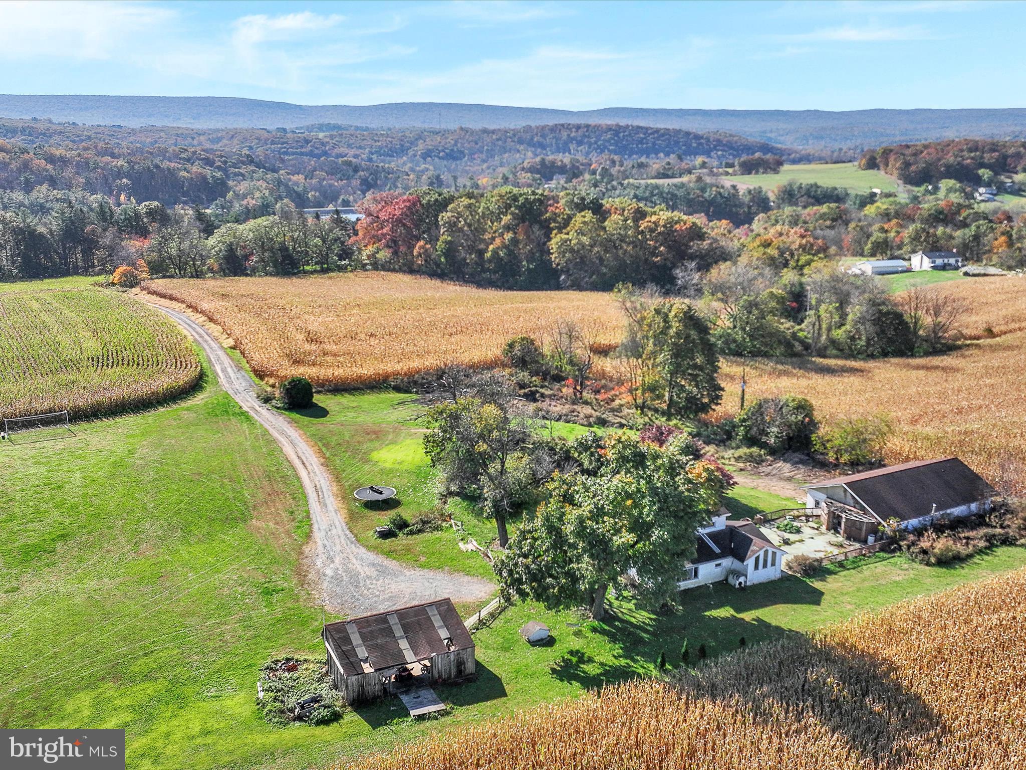 389 Sweet Arrow Lake Road Pine Grove, PA 17963 - Photo 12 of 59 an aerial view of residential houses with outdoor space and trees