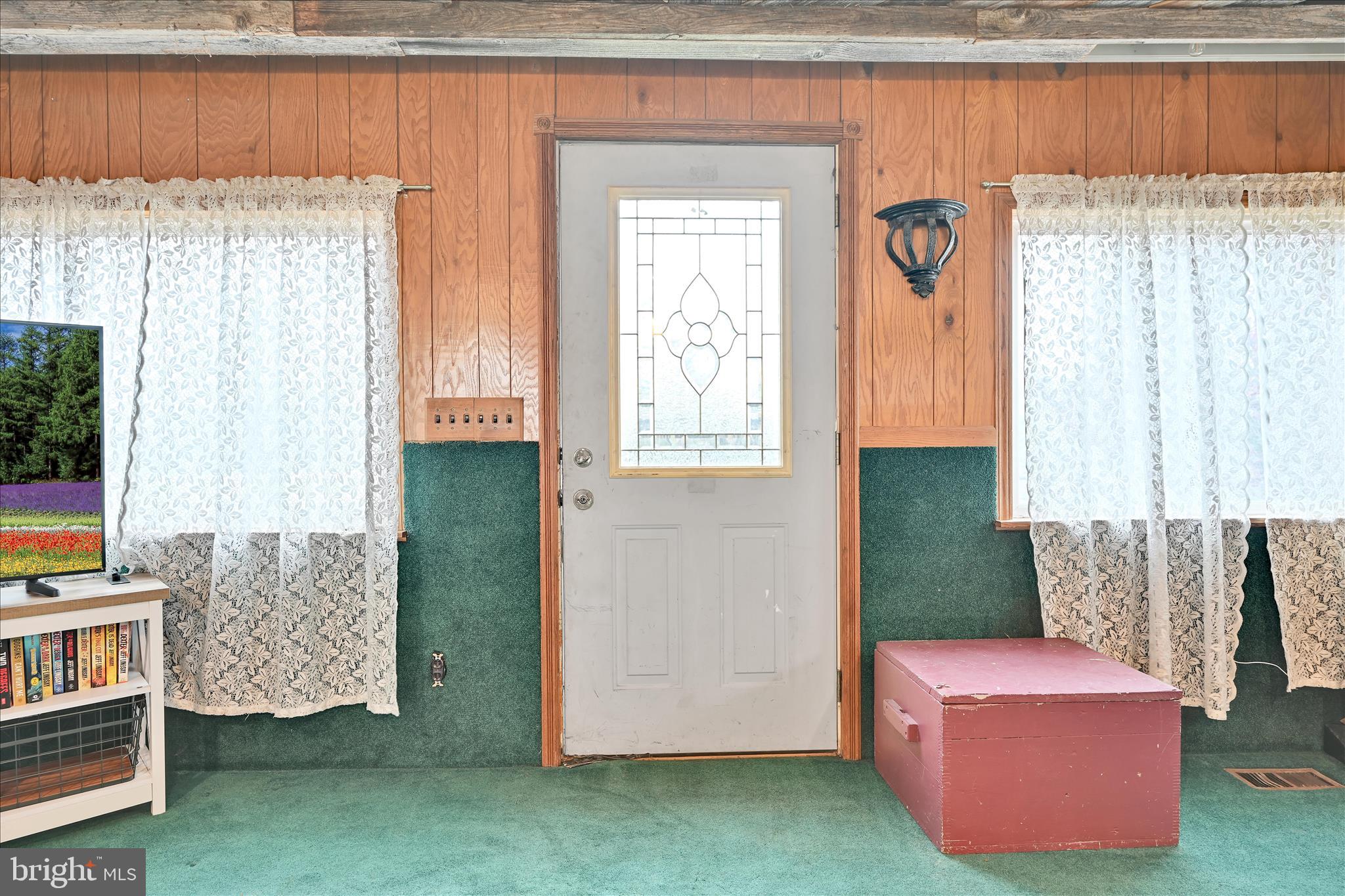 389 Sweet Arrow Lake Road Pine Grove, PA 17963 - Photo 23 of 59 a living room with furniture and a window