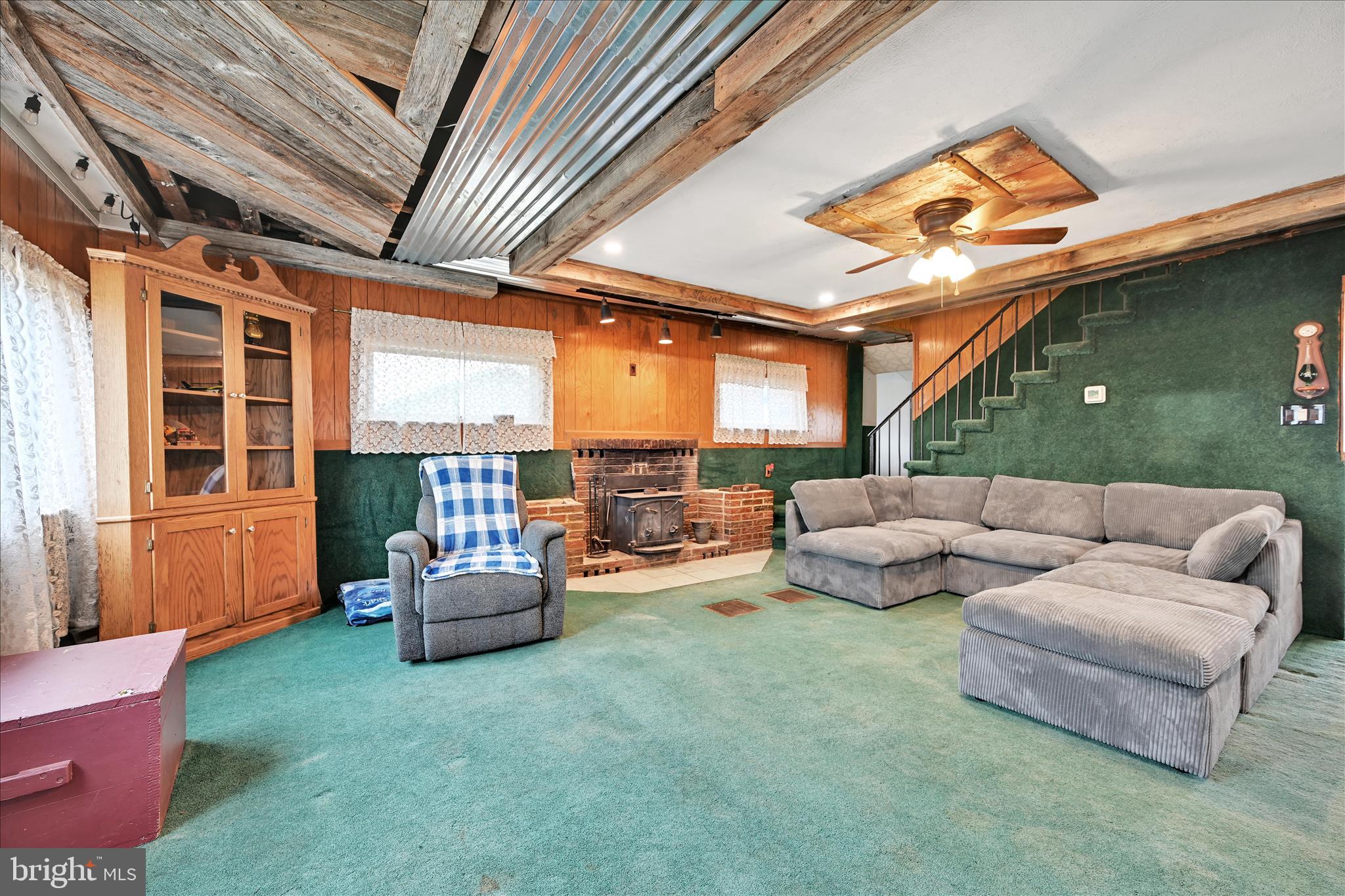 389 Sweet Arrow Lake Road Pine Grove, PA 17963 - Photo 24 of 59 a living room with furniture and a large window