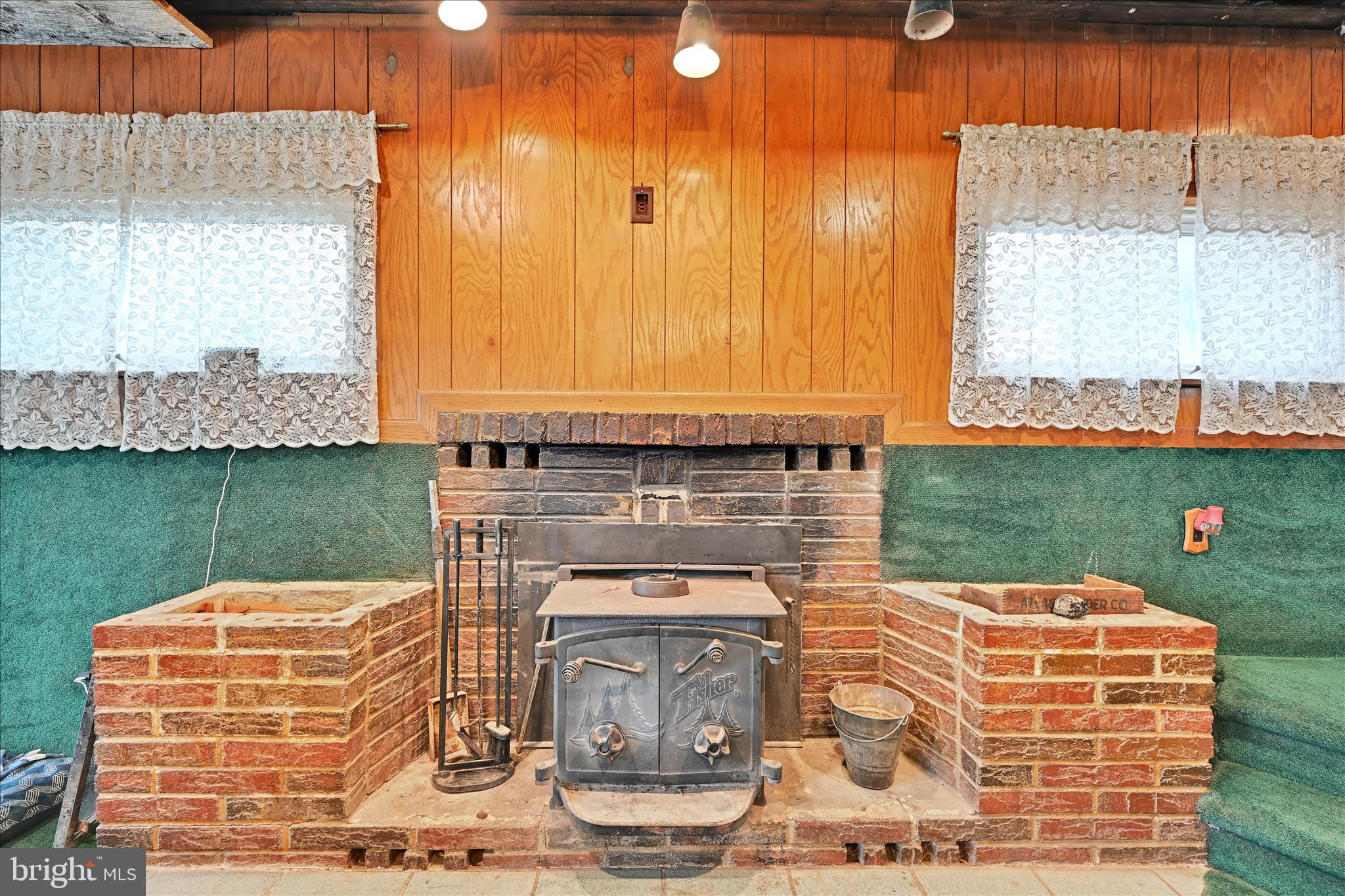 389 Sweet Arrow Lake Road Pine Grove, PA 17963 - Photo 27 of 59 a bathroom with a granite countertop sink and a mirror