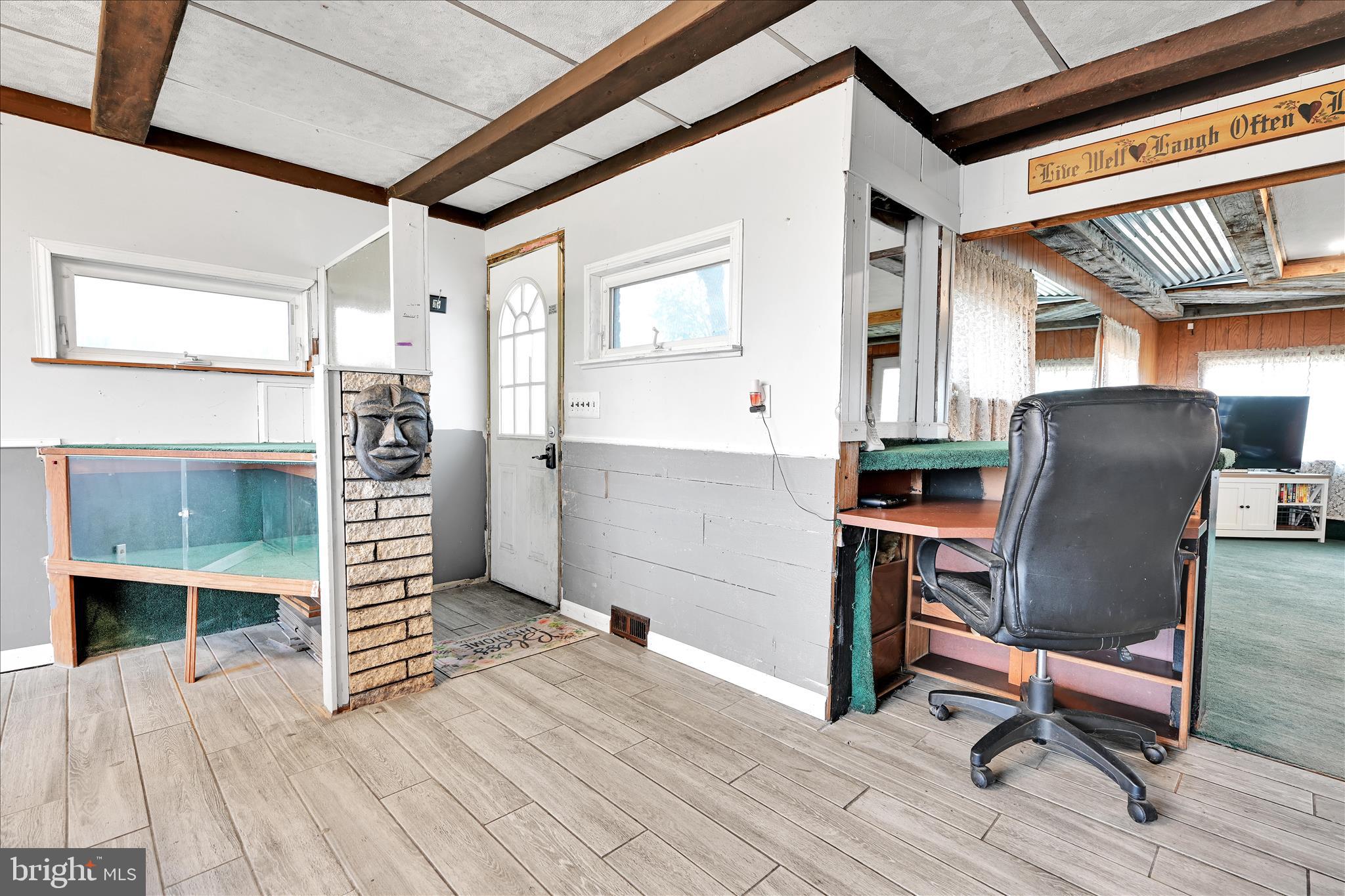 389 Sweet Arrow Lake Road Pine Grove, PA 17963 - Photo 28 of 59 a view of workspace with wooden floor and furniture