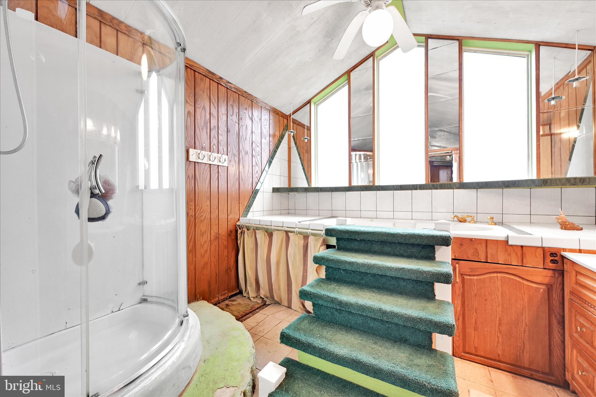 389 Sweet Arrow Lake Road Pine Grove, PA 17963 - Photo 40 of 59 a bathroom with a sink a toilet and tub