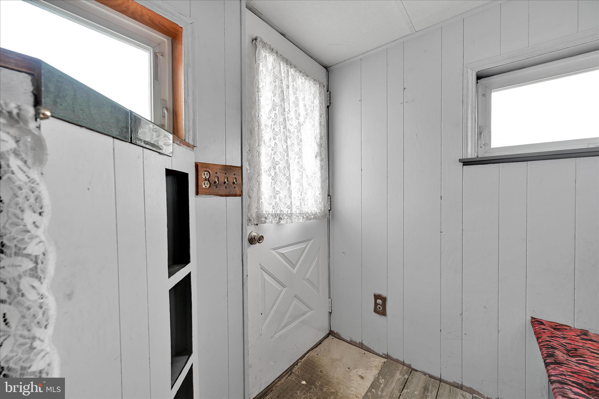 389 Sweet Arrow Lake Road Pine Grove, PA 17963 - Photo 46 of 59 a view of hallway with window and refrigerator