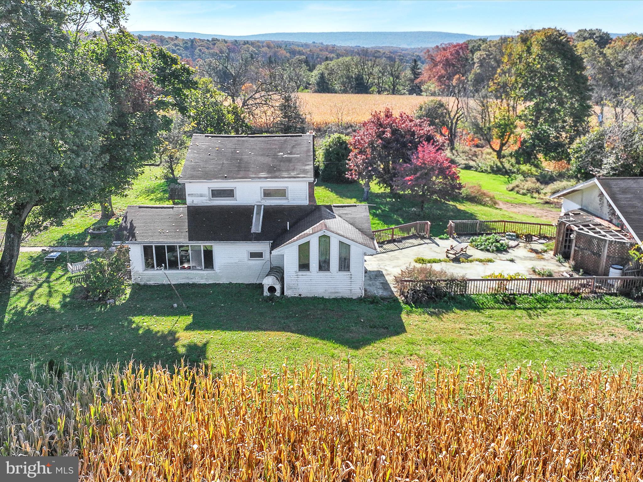389 Sweet Arrow Lake Road Pine Grove, PA 17963 - Photo 9 of 59 a aerial view of a house with a garden and a yard