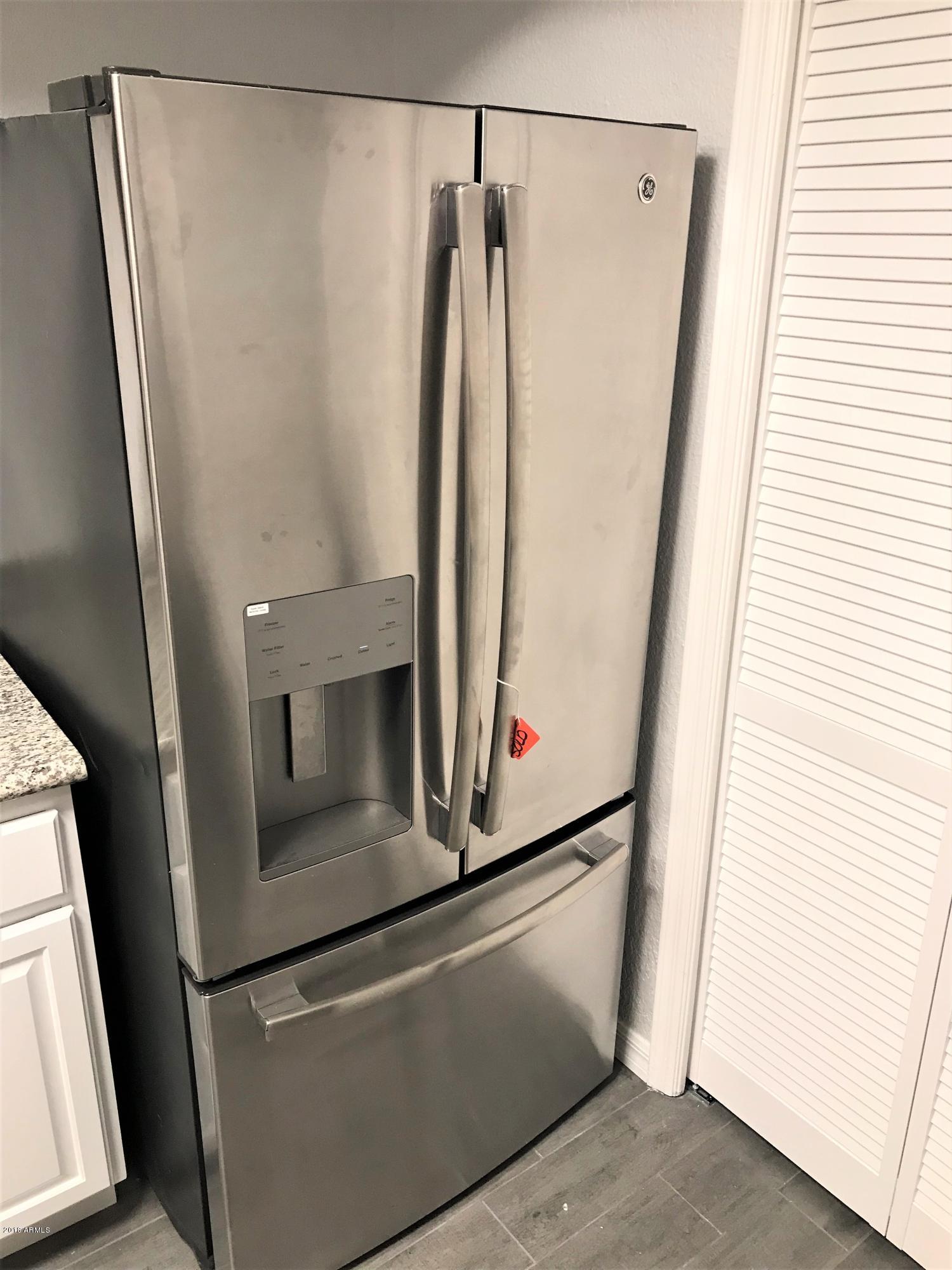 7438 Hum Road, Unit 106 Carefree, AZ 85377 - Photo 21 of 55 fridge - Outside