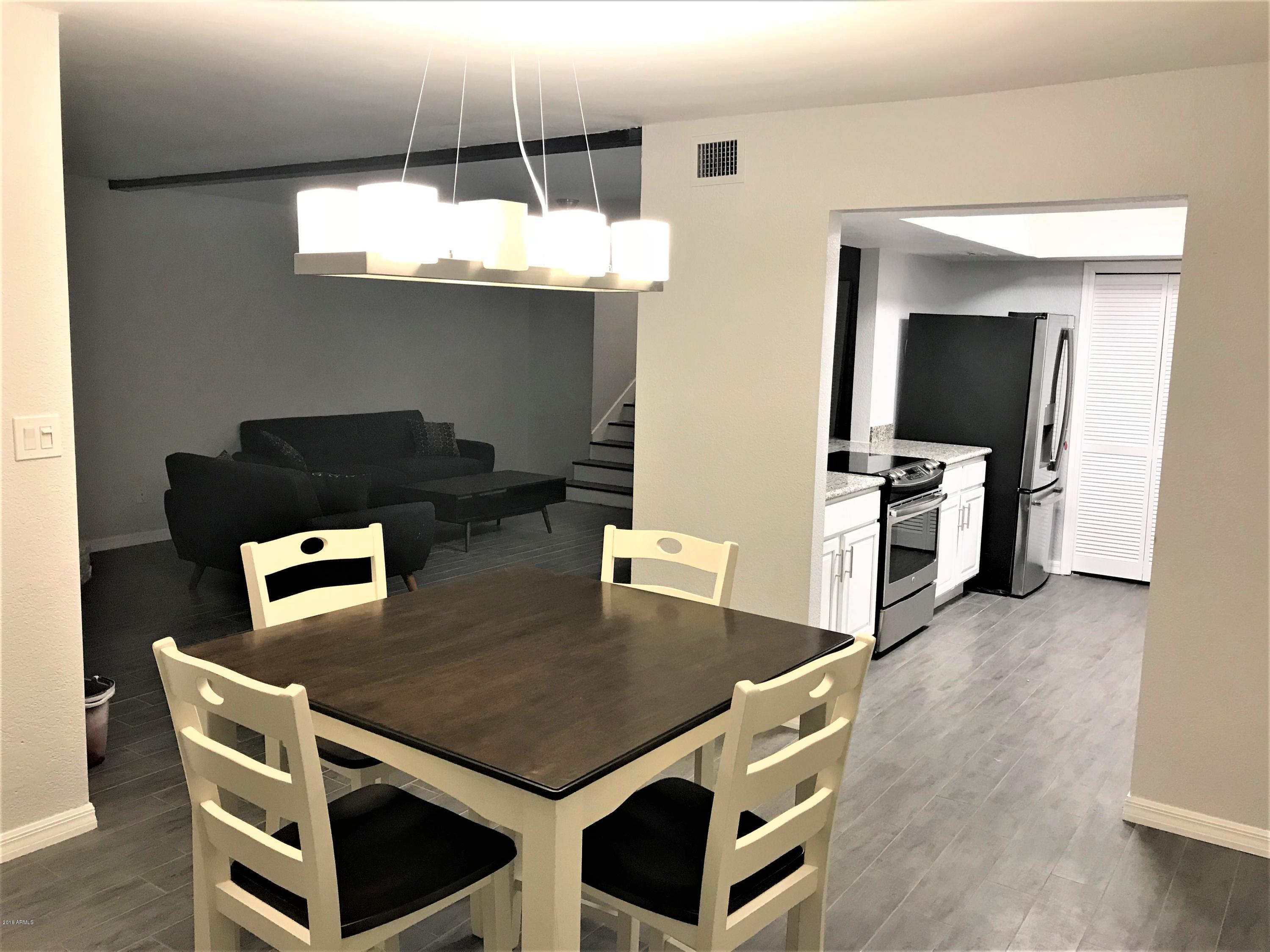 7438 Hum Road, Unit 106 Carefree, AZ 85377 - Photo 22 of 55 Dining to Living
