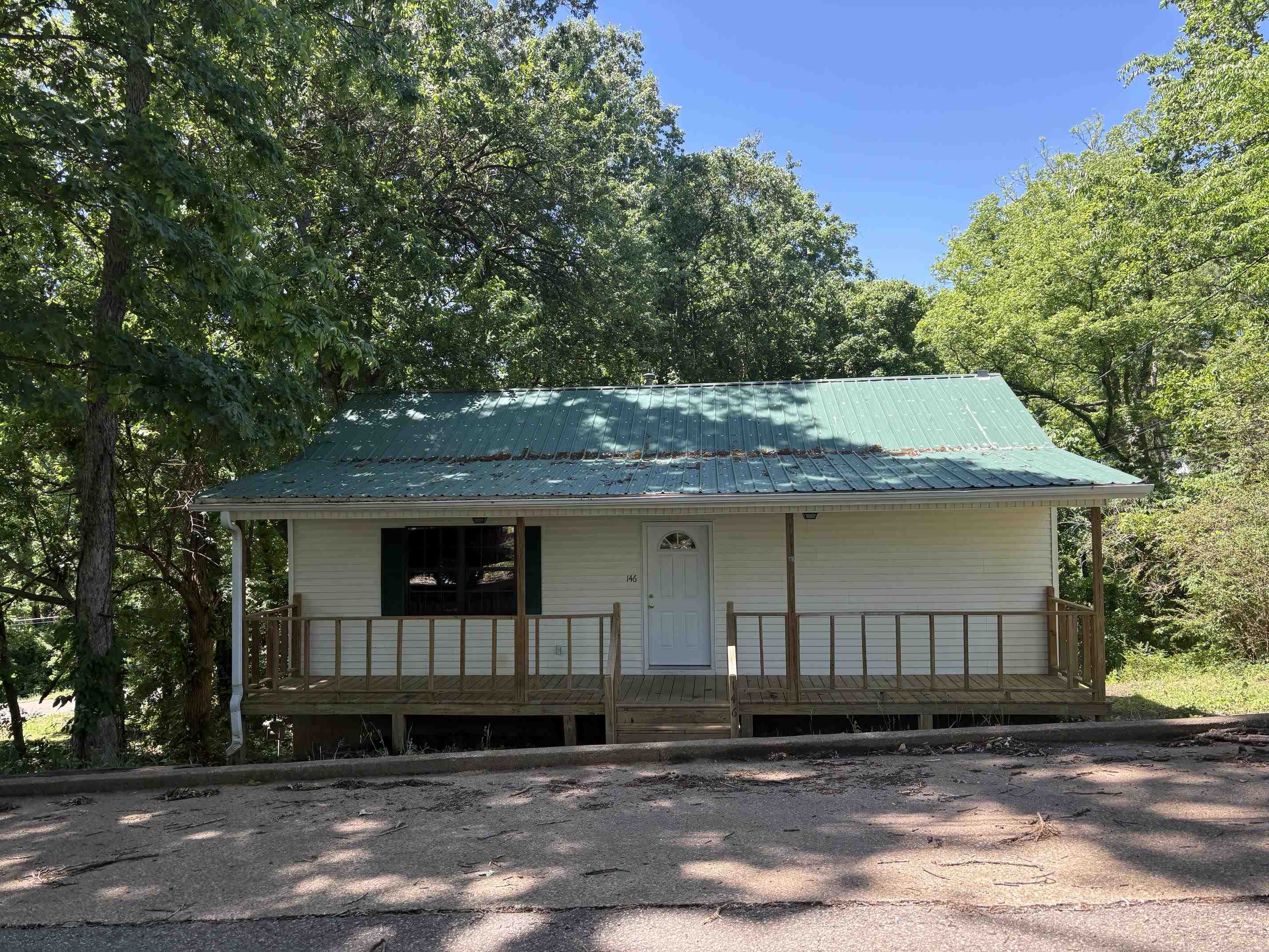 146 Walker Street Ripley, TN 38063 - Photo 2 of 14 a front view of a house with a yard
