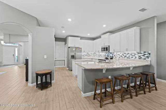 a bedroom with bed and window