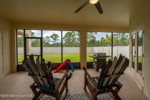 a view of a garden with swimming pool