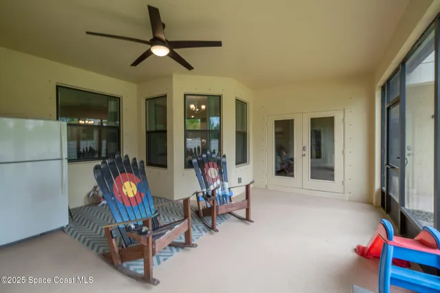 a view of a swimming pool with a yard