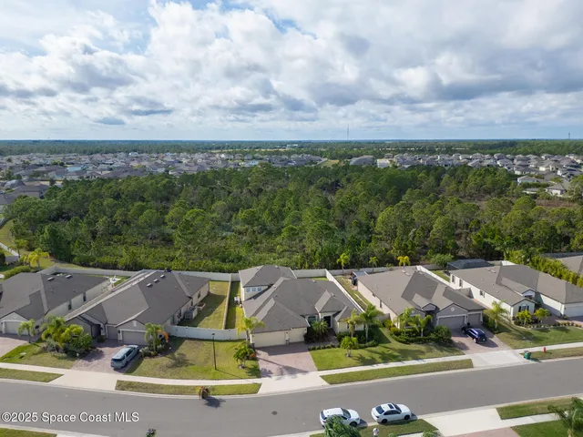 an aerial view of a with a swimming pool yard and outdoor seating
