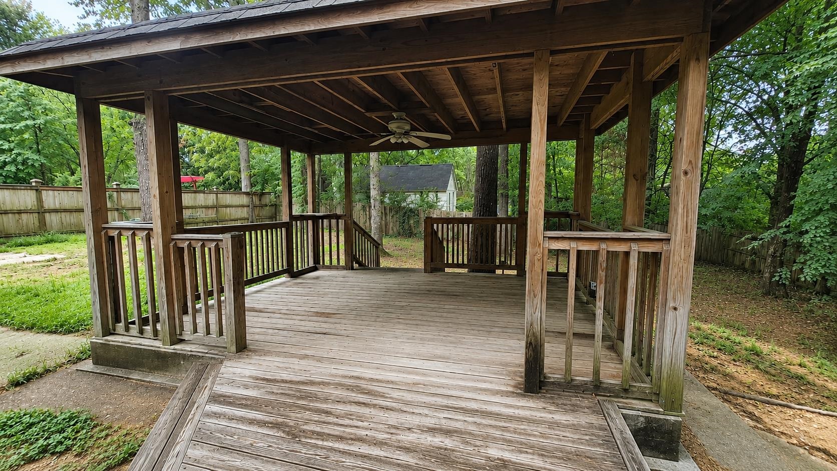 89 Ericson Road Memphis, TN 38018 - Photo 31 of 36 a view of a deck with wooden floor and roof with a garden view