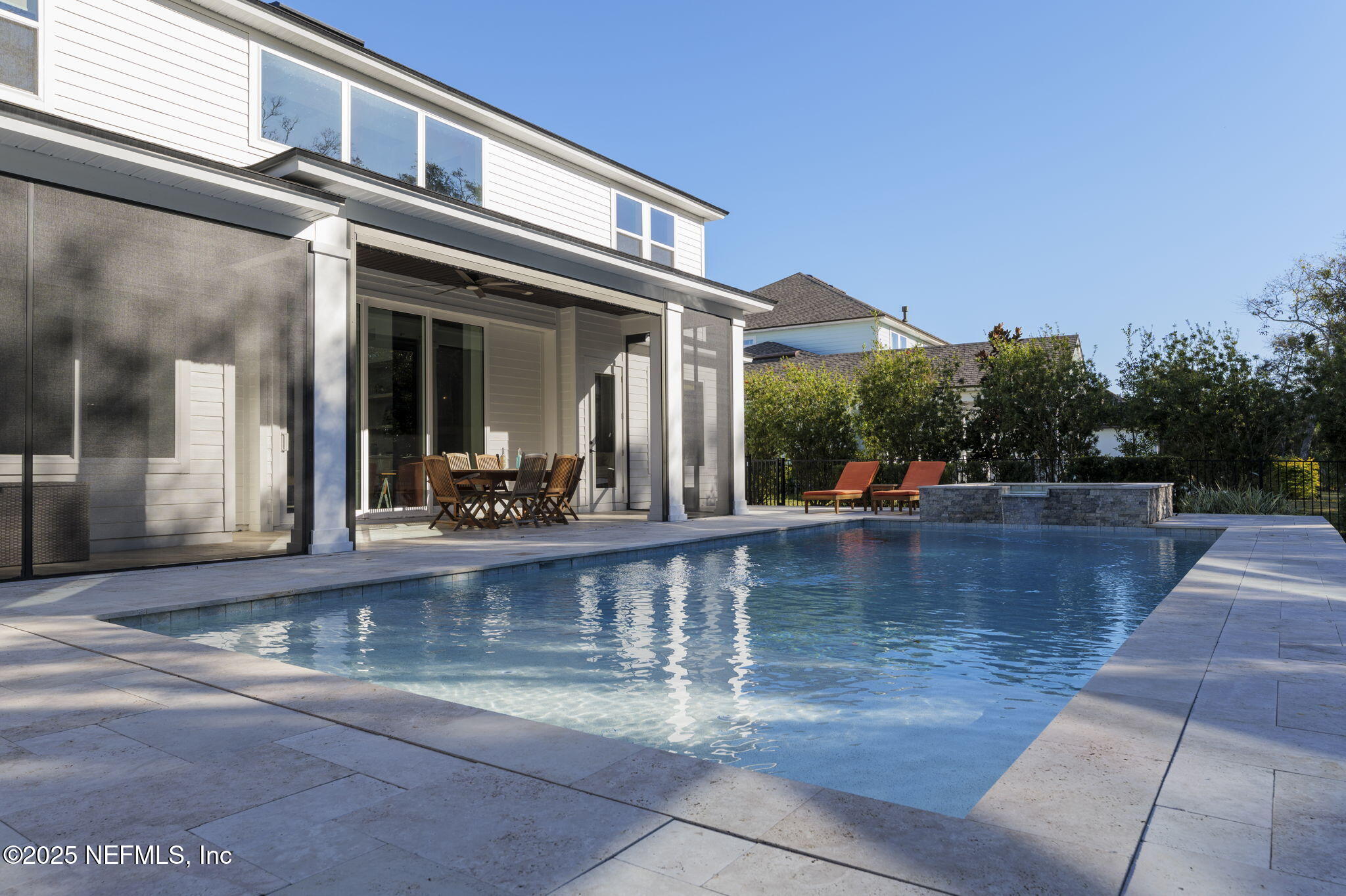 251 Vale Drive St. Augustine, FL 32095 - Photo 25 of 74 a view of a swimming pool with outdoor seating