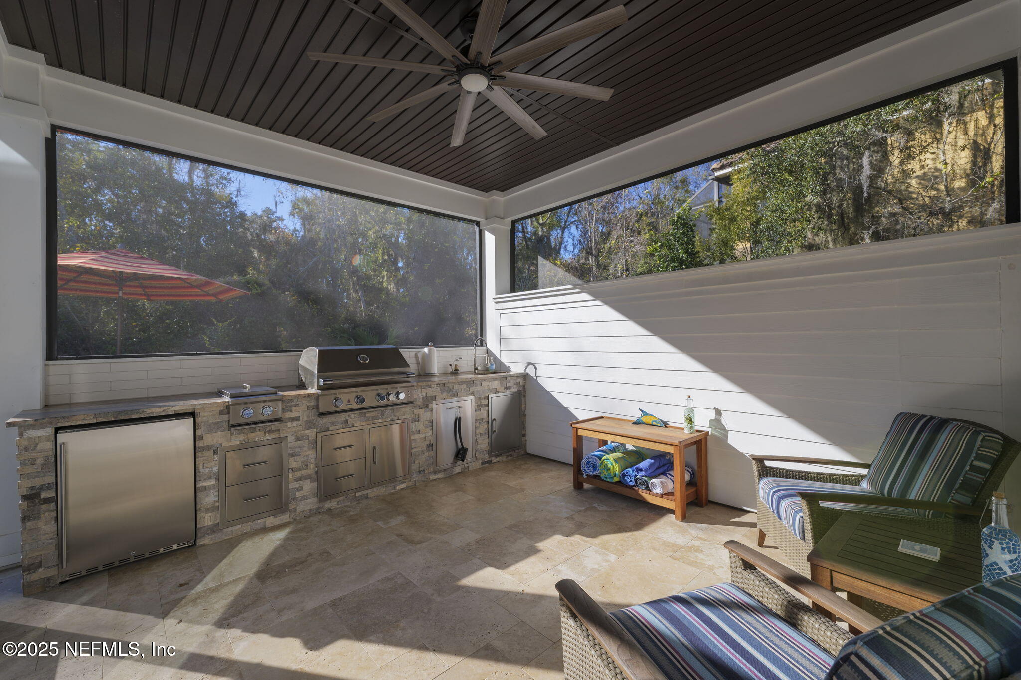 251 Vale Drive St. Augustine, FL 32095 - Photo 28 of 74 a view of a patio with wooden floor
