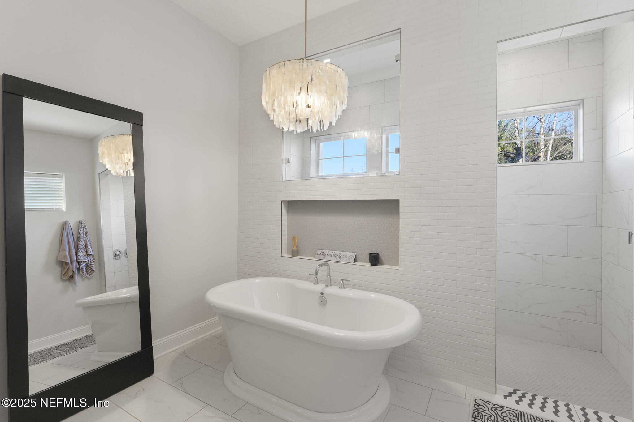 251 Vale Drive St. Augustine, FL 32095 - Photo 55 of 74 a bathroom with a sink and a mirror