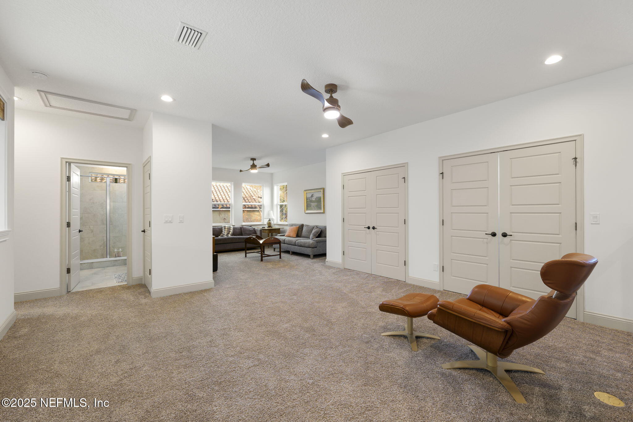 251 Vale Drive St. Augustine, FL 32095 - Photo 57 of 74 a living room with furniture and a ceiling fan
