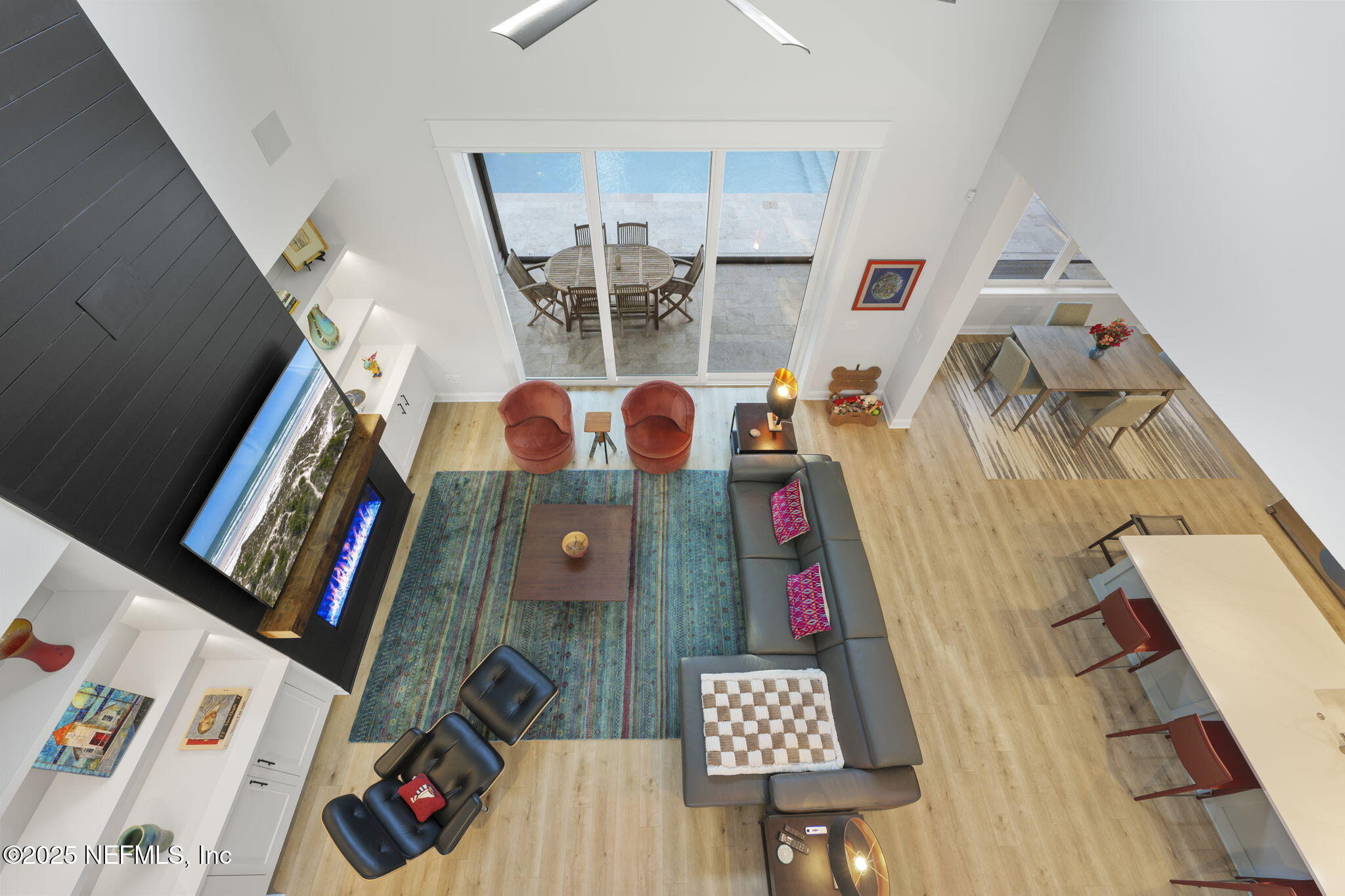 251 Vale Drive St. Augustine, FL 32095 - Photo 63 of 74 a living room with furniture and a floor to ceiling window