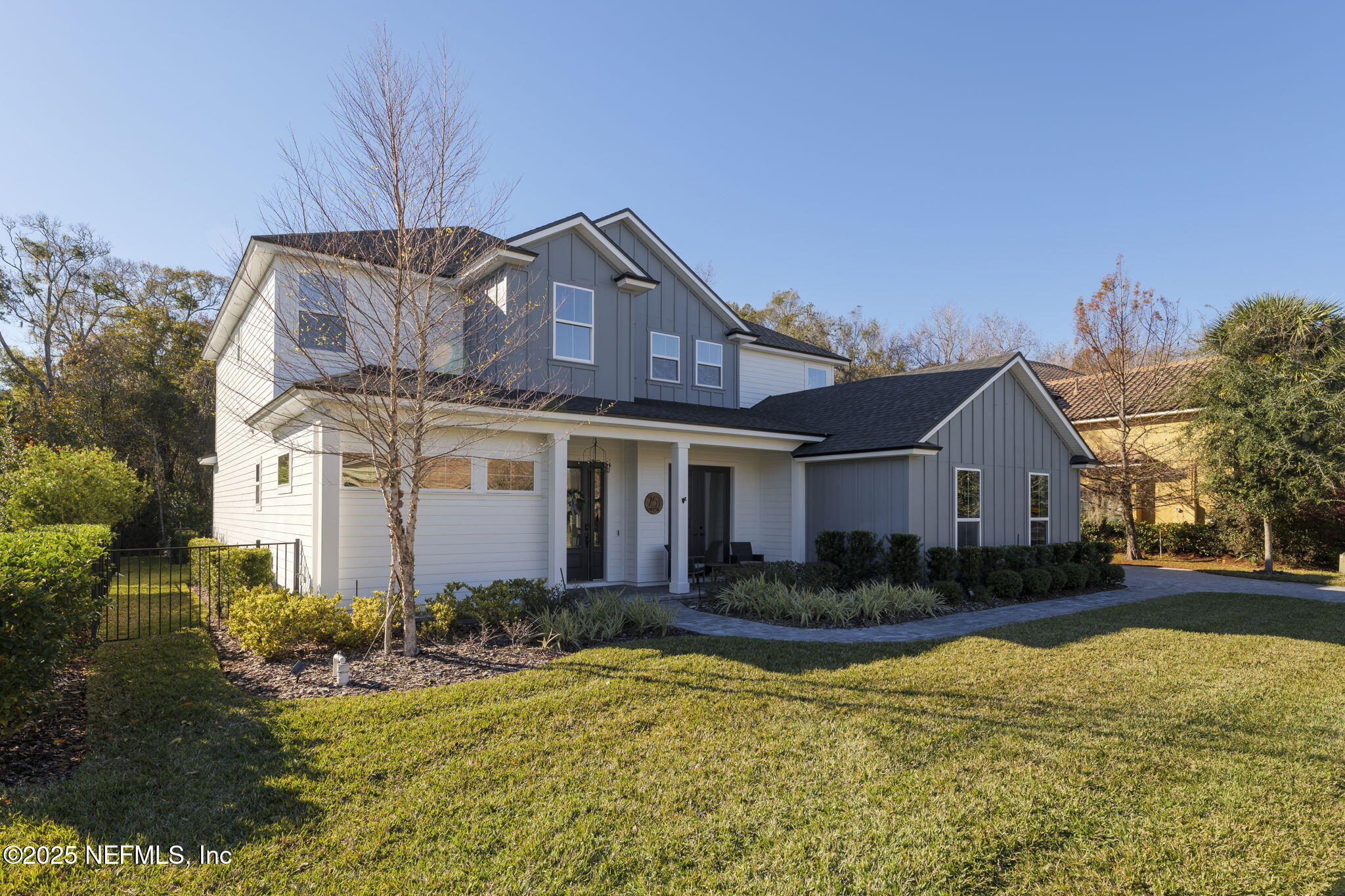 251 Vale Drive St. Augustine, FL 32095 - Photo 7 of 74 a front view of house with yard and green space