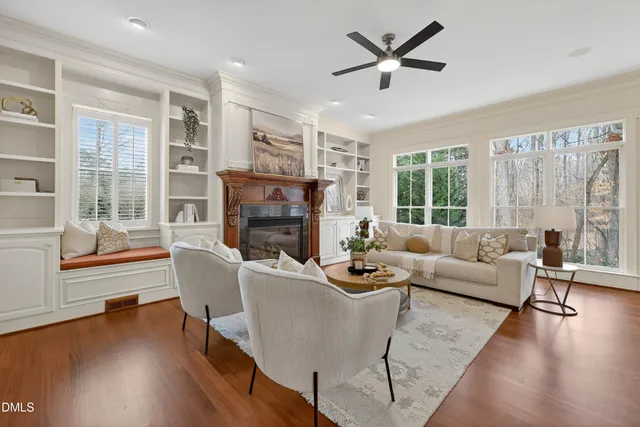a bed room with a bed and a chandelier