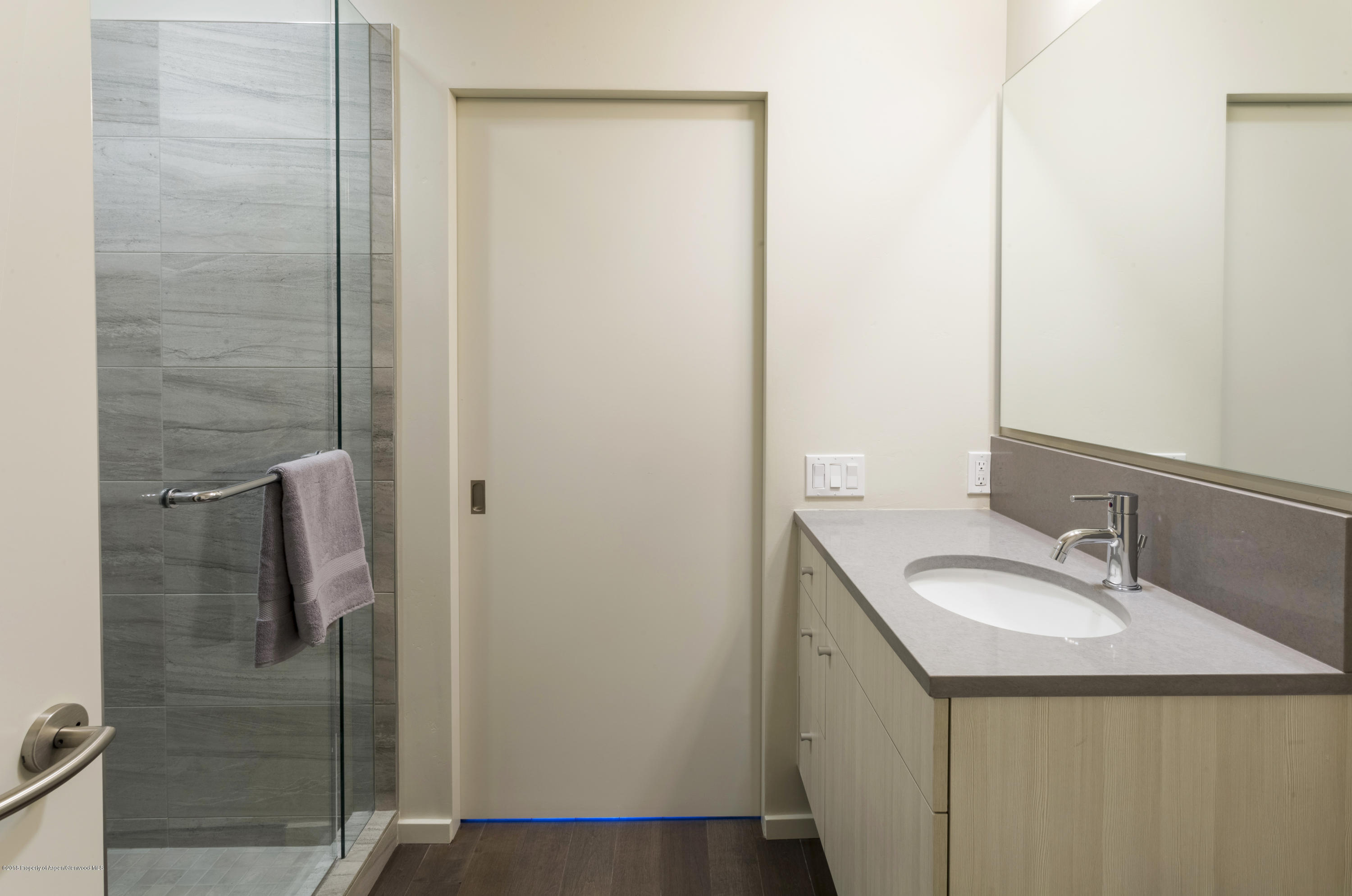 100 Evans Road, Unit 202 Basalt, CO 81621 - Photo 11 of 25 a bathroom with a sink and a mirror