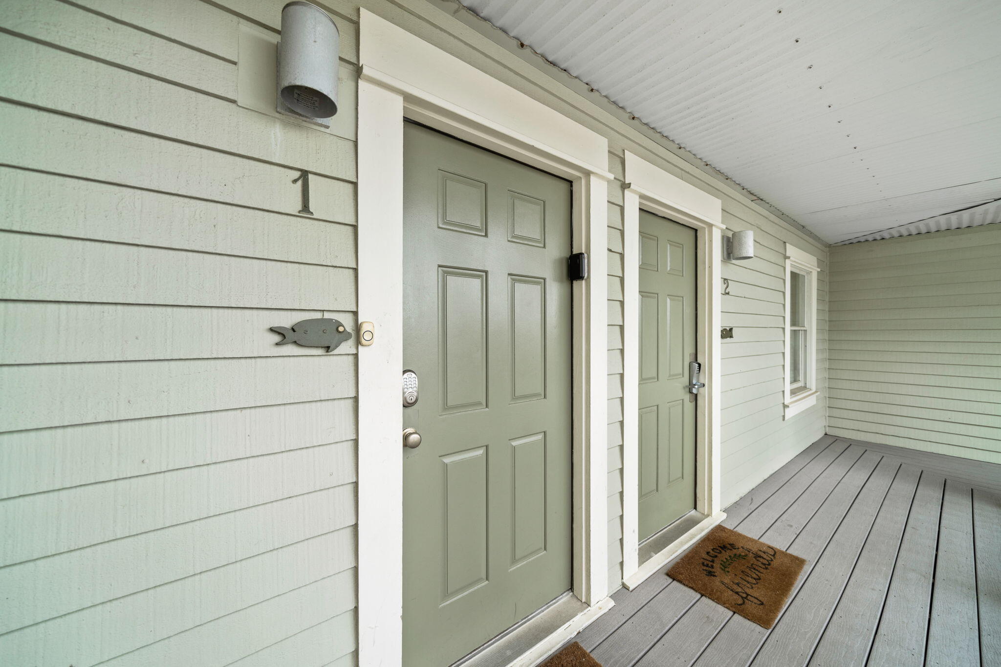 8294 East County Highway 30A, Unit 1 Inlet Beach, FL 32461 - Photo 34 of 45 a view of front door and wooden floor