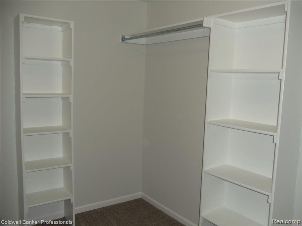 4711 Duck Lake Road North Highland, MI 48356 - Photo 17 of 29 Lots of built-ins in this master bedroom closet.