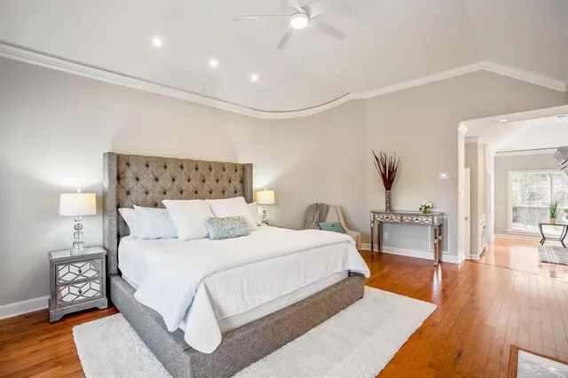 a bedroom with bed and a fireplace