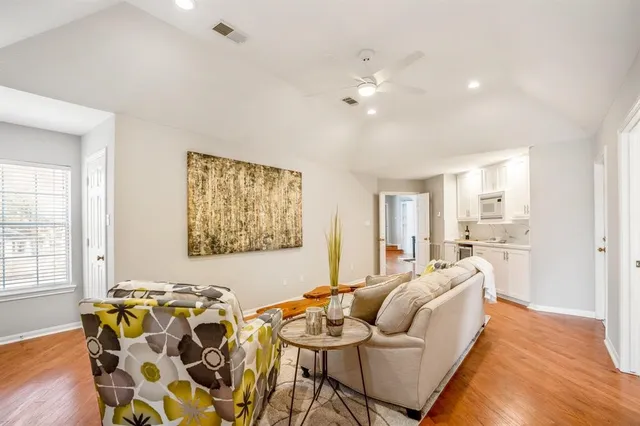 a view of room with wooden floor and window