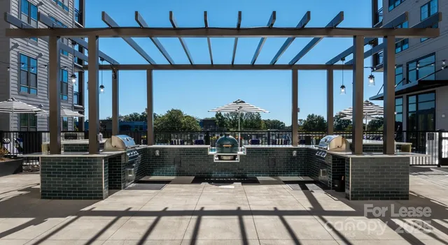 a view of roof deck with seating space